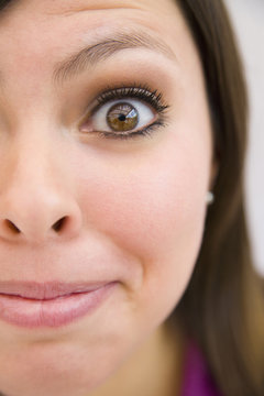 Close up of grinning Hispanic woman