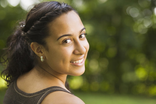 Smiling mixed race woman