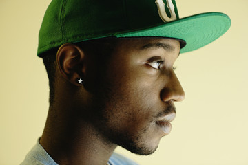 African American man wearing baseball cap