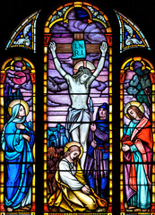 Stained glass crucifixtion of Christ scene