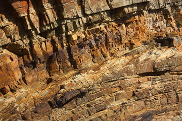 Striated Rocks On Cliff Face