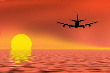 Airplane on sunset sky