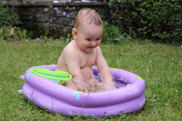 joy child in swimming-pool