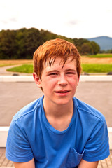 portrait of young boy doing sports