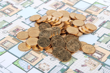 coins on house plan