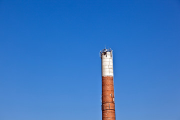 chimney of old abandoned industrial building