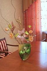 decorative flowers in a vase on a table