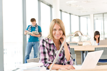 Back to school - female student with laptop