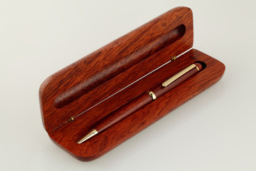 ballpoint in a wooden box