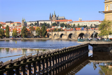 Fototapeta na wymiar Autumn Prague gothic Castle with the Charles Bridge