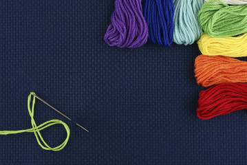 Dark blue outline with threads