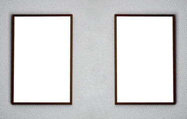 empty two frames on white wall in the exhibition