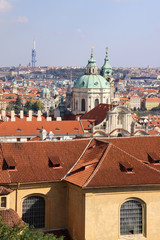 Fototapeta na wymiar View on autumn Prague with St. Nicholas' Cathedral