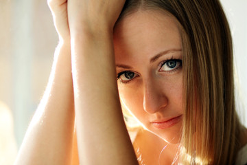 Naklejka premium Closeup portrait of a cute young woman