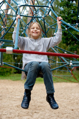 Outdoor portrait of smiling little girl