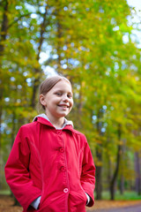 Outdoor portrait of smiling little girl