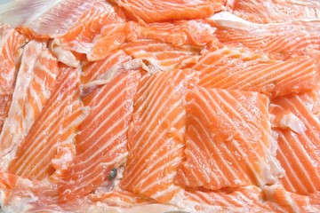 Fresh sliced salmon Fillet using as background