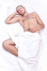Man lying in bed and sleeping