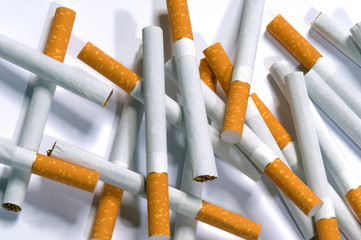 cigarettes lying on a white background