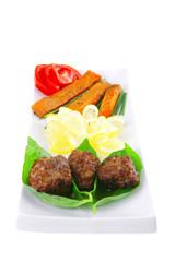 meatballs with tomatoes and lemon