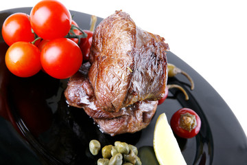grilled meat medallion with cherry tomatoes