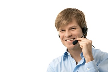 Happy young man talking on headset