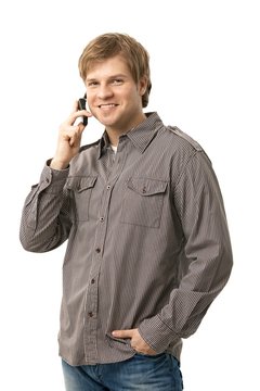 Casual young man talking on mobile