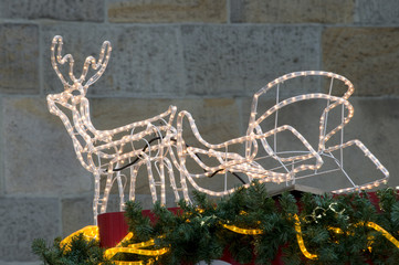 Obraz premium Rentier mit Schlitten Weihnachtsmarkt Dortmund