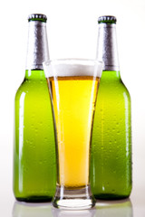 Glass of beer on a white background 
