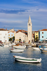 Fishing boats and church in Fazana