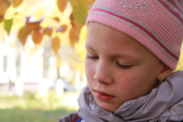 The girl in autumn park