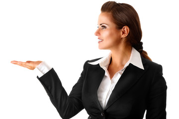 smiling modern business woman presenting something on empty hand