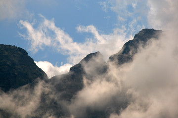 Clouds dancing in front of rock walls in the Tatra Mountains
