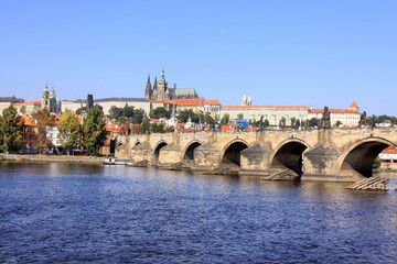 Fototapeta premium Autumn Prague gothic Castle with the Charles Bridge