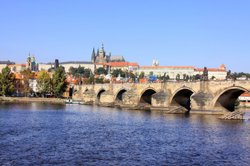Fototapeta na wymiar Autumn Prague gothic Castle with the Charles Bridge