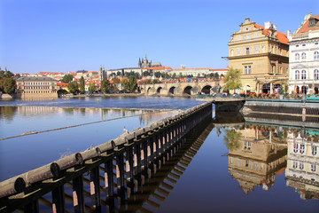 Fototapeta premium Autumn Prague gothic Castle with the Charles Bridge