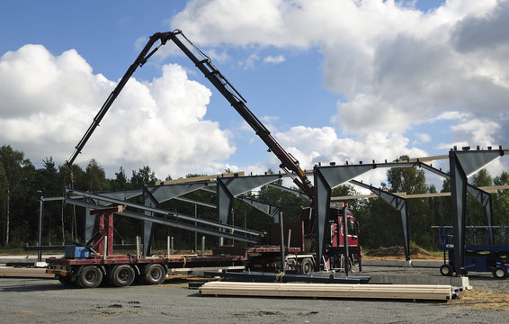 Crane car in metal construction area