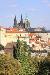 Obraz premium The View on the autumn Prague gothic Castle