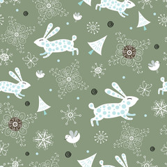 Seamless pattern of rabbits and snowflakes