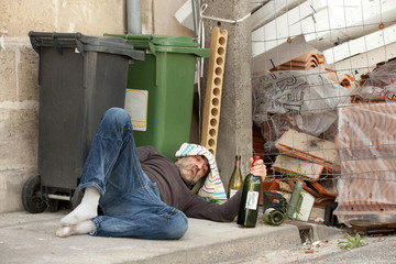 poor drunk man in city