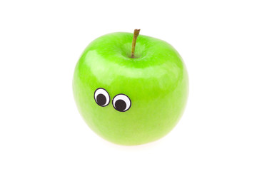 apples with eyes and faces isolated on white