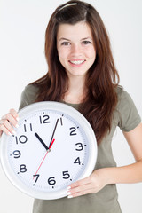 teen beauty holding clock