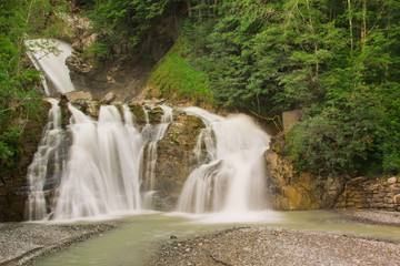 Obraz premium Waterfall in green nature