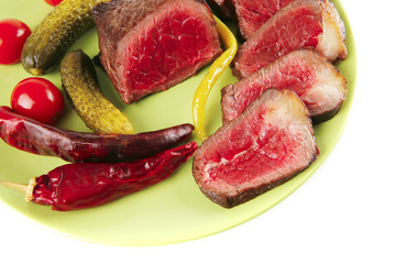 red beef slices on green dish