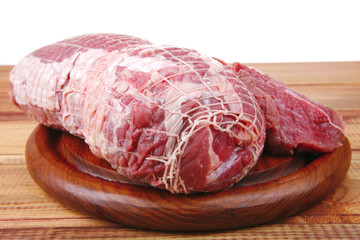 red meat on wooden table