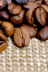 Brown coffee grains on a sacking