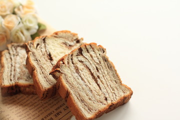 Chocolate bread on white background