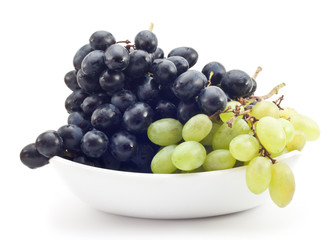 branch of green and black grapes