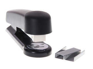 Black office stapler isolated on white background