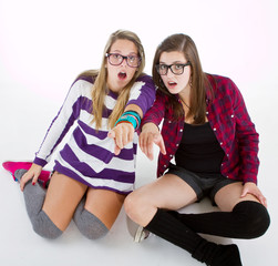 Young trendy teenagers in a nerd / geek style.